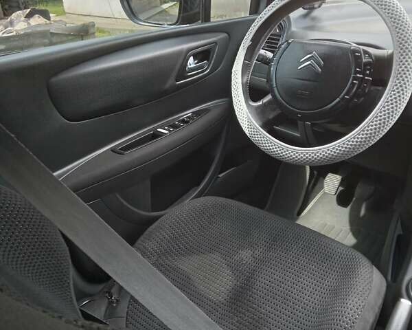 Серый Ситроен С4, объемом двигателя 1.6 л и пробегом 244 тыс. км за 3800 $, фото 8 на Automoto.ua