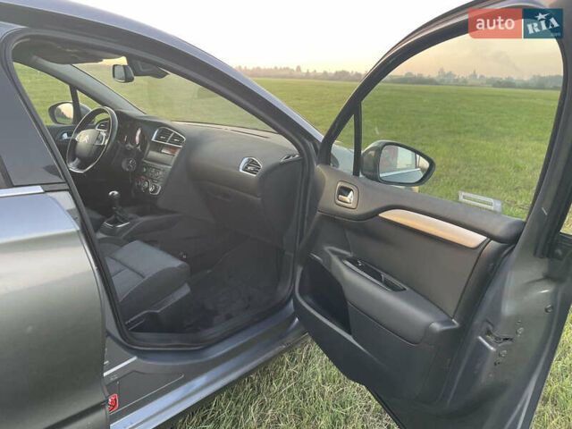 Серый Ситроен С4, объемом двигателя 1.6 л и пробегом 183 тыс. км за 5550 $, фото 16 на Automoto.ua