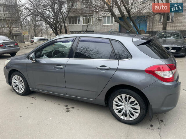Серый Ситроен С4, объемом двигателя 1.6 л и пробегом 175 тыс. км за 5800 $, фото 1 на Automoto.ua