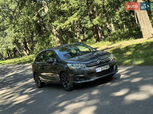 Серый Ситроен С4, объемом двигателя 1.56 л и пробегом 197 тыс. км за 7000 $, фото 36 на Automoto.ua