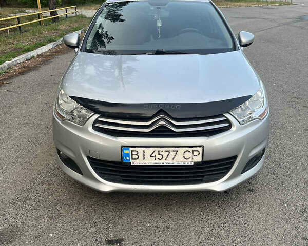 Серый Ситроен С4, объемом двигателя 1.59 л и пробегом 104 тыс. км за 8800 $, фото 2 на Automoto.ua