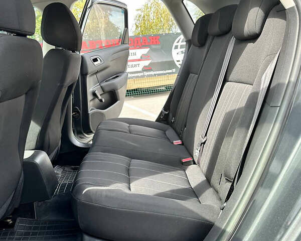 Серый Ситроен С4, объемом двигателя 1.4 л и пробегом 130 тыс. км за 7999 $, фото 9 на Automoto.ua