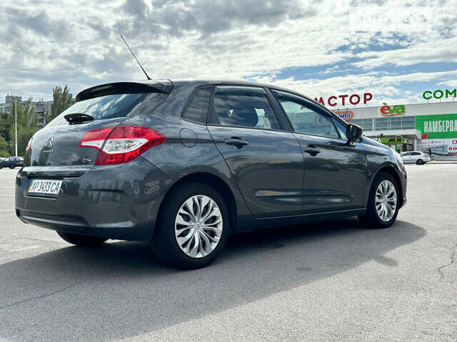 Серый Ситроен С4, объемом двигателя 1.4 л и пробегом 130 тыс. км за 7999 $, фото 2 на Automoto.ua