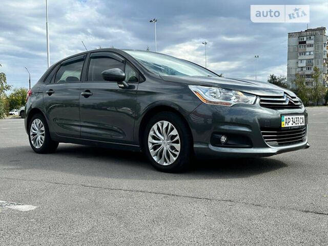 Серый Ситроен С4, объемом двигателя 1.4 л и пробегом 130 тыс. км за 7999 $, фото 1 на Automoto.ua