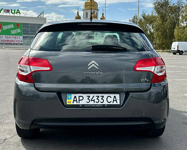 Серый Ситроен С4, объемом двигателя 1.4 л и пробегом 130 тыс. км за 7999 $, фото 3 на Automoto.ua