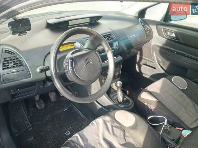 Серый Ситроен С4, объемом двигателя 1.59 л и пробегом 245 тыс. км за 2400 $, фото 6 на Automoto.ua