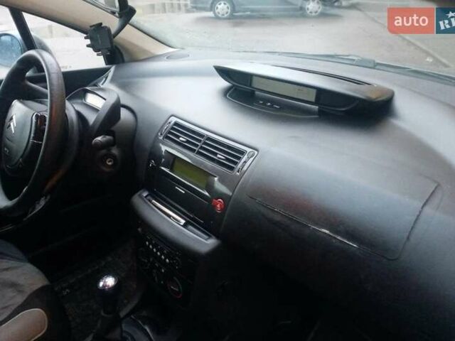 Серый Ситроен С4, объемом двигателя 1.59 л и пробегом 245 тыс. км за 2400 $, фото 5 на Automoto.ua