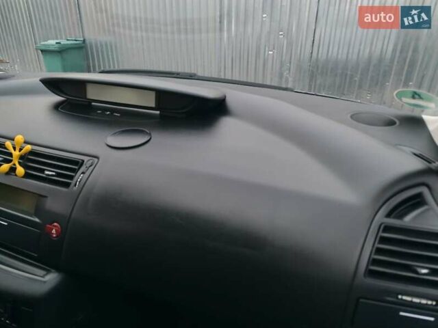 Синий Ситроен С4, объемом двигателя 1.4 л и пробегом 195 тыс. км за 3400 $, фото 4 на Automoto.ua