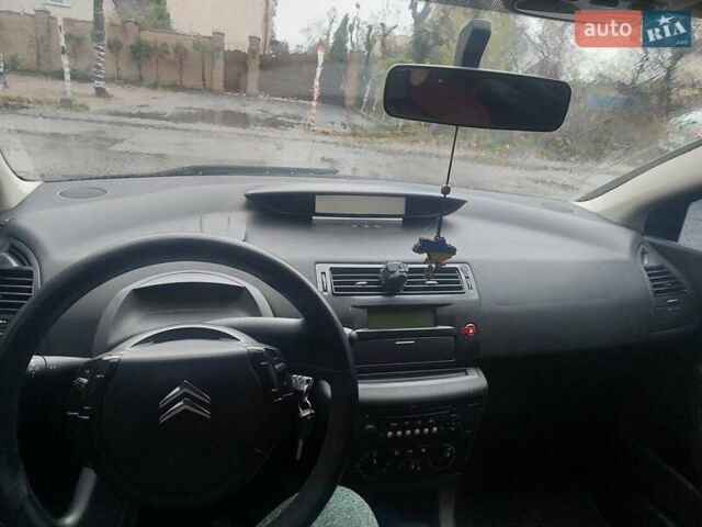 Синий Ситроен С4, объемом двигателя 1.56 л и пробегом 282 тыс. км за 3900 $, фото 5 на Automoto.ua
