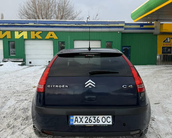 Синий Ситроен С4, объемом двигателя 1.6 л и пробегом 129 тыс. км за 4000 $, фото 5 на Automoto.ua