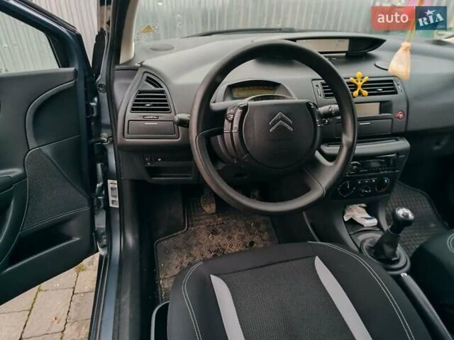 Синий Ситроен С4, объемом двигателя 1.4 л и пробегом 195 тыс. км за 3400 $, фото 3 на Automoto.ua