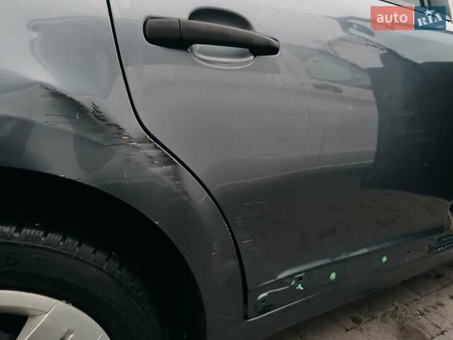 Синий Ситроен С4, объемом двигателя 1.4 л и пробегом 195 тыс. км за 3400 $, фото 10 на Automoto.ua