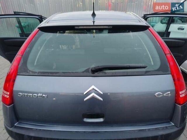 Синий Ситроен С4, объемом двигателя 1.4 л и пробегом 195 тыс. км за 3400 $, фото 2 на Automoto.ua