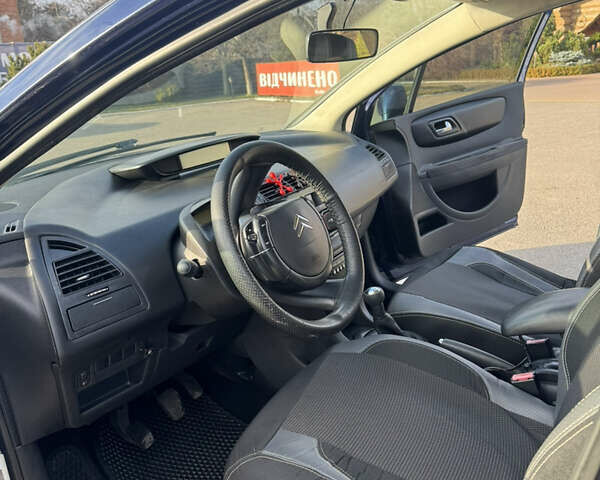 Синий Ситроен С4, объемом двигателя 1.6 л и пробегом 250 тыс. км за 5500 $, фото 4 на Automoto.ua