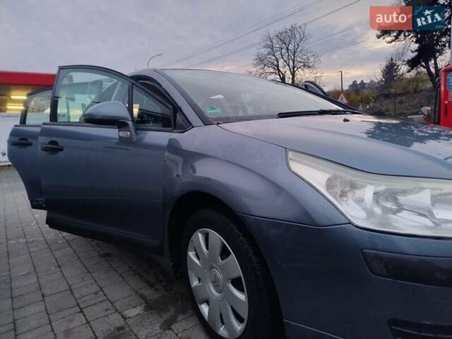 Синий Ситроен С4, объемом двигателя 1.4 л и пробегом 195 тыс. км за 3400 $, фото 18 на Automoto.ua