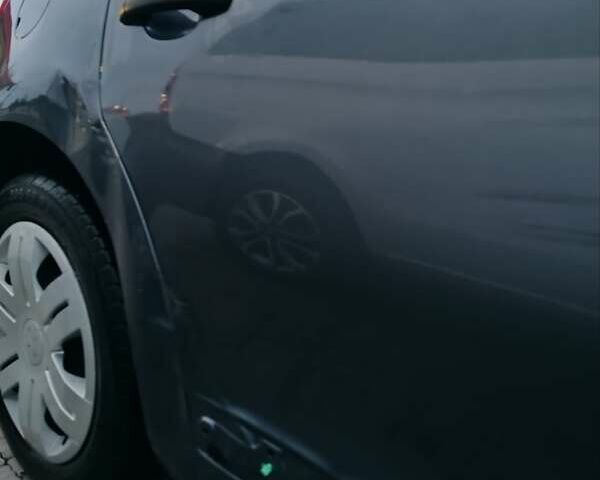 Синий Ситроен С4, объемом двигателя 1.4 л и пробегом 195 тыс. км за 3400 $, фото 7 на Automoto.ua