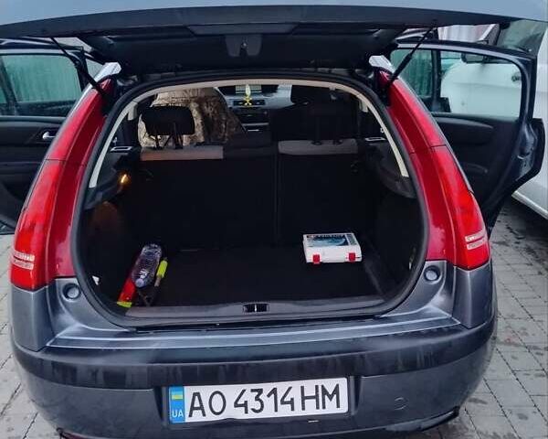 Синий Ситроен С4, объемом двигателя 1.4 л и пробегом 195 тыс. км за 3400 $, фото 11 на Automoto.ua