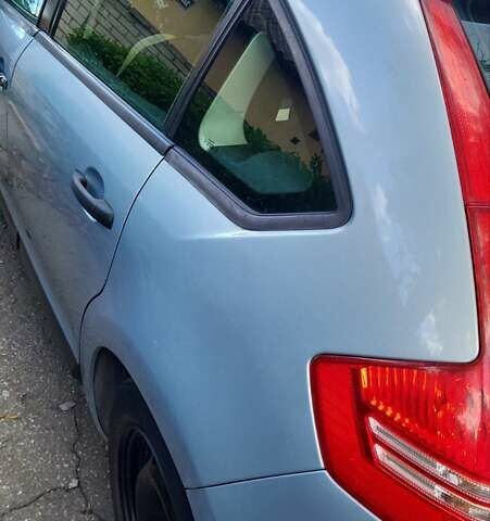 Синий Ситроен С4, объемом двигателя 1.6 л и пробегом 195 тыс. км за 3650 $, фото 3 на Automoto.ua