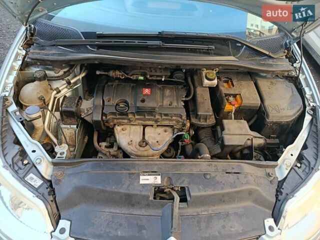 Синий Ситроен С4, объемом двигателя 1.6 л и пробегом 306 тыс. км за 4500 $, фото 2 на Automoto.ua