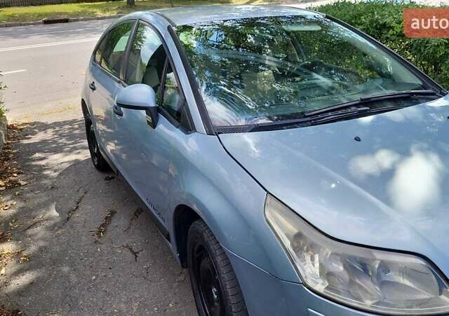 Синий Ситроен С4, объемом двигателя 1.6 л и пробегом 195 тыс. км за 3650 $, фото 1 на Automoto.ua