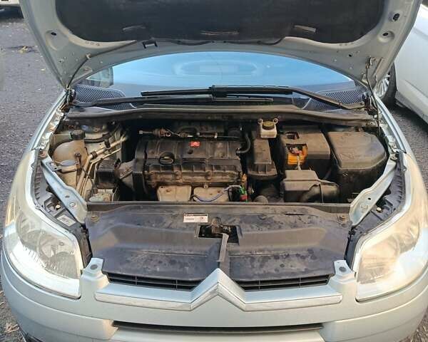 Синий Ситроен С4, объемом двигателя 1.6 л и пробегом 306 тыс. км за 4500 $, фото 1 на Automoto.ua