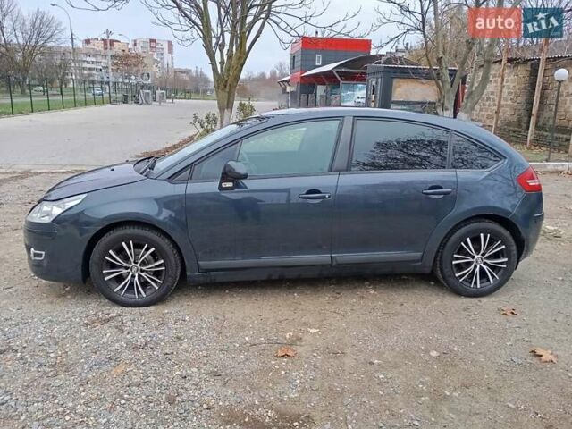 Синий Ситроен С4, объемом двигателя 1.59 л и пробегом 132 тыс. км за 4500 $, фото 1 на Automoto.ua