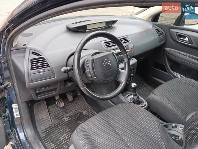 Синий Ситроен С4, объемом двигателя 1.59 л и пробегом 132 тыс. км за 4500 $, фото 5 на Automoto.ua