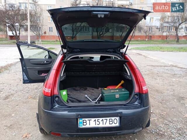 Синий Ситроен С4, объемом двигателя 1.59 л и пробегом 132 тыс. км за 4500 $, фото 12 на Automoto.ua