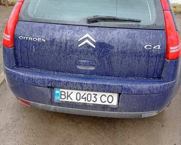 Синий Ситроен С4, объемом двигателя 1.6 л и пробегом 275 тыс. км за 3500 $, фото 2 на Automoto.ua
