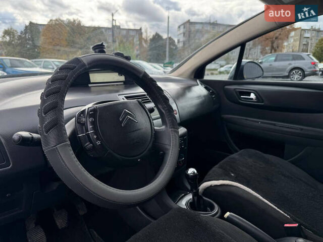 Синий Ситроен С4, объемом двигателя 1.6 л и пробегом 233 тыс. км за 4200 $, фото 5 на Automoto.ua