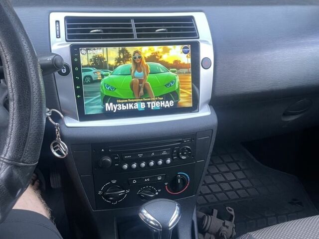 Синий Ситроен С4, объемом двигателя 1.6 л и пробегом 250 тыс. км за 4300 $, фото 4 на Automoto.ua