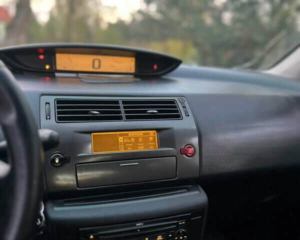 Синій Сітроен С4, об'ємом двигуна 1.59 л та пробігом 242 тис. км за 2399 $, фото 14 на Automoto.ua