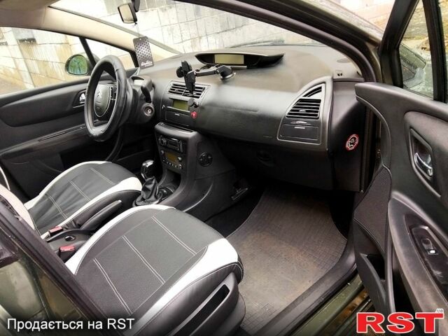 Зелений Сітроен С4, об'ємом двигуна 1.6 л та пробігом 182 тис. км за 4200 $, фото 6 на Automoto.ua