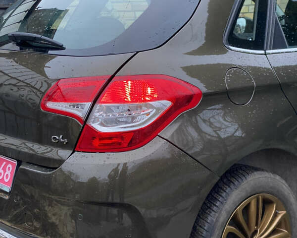 Зелений Сітроен С4, об'ємом двигуна 1.6 л та пробігом 167 тис. км за 9300 $, фото 8 на Automoto.ua