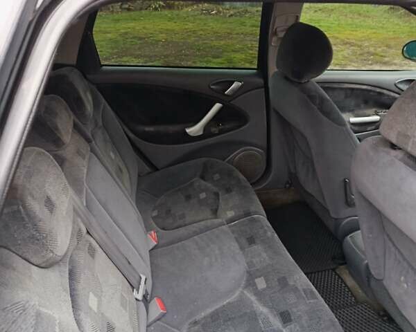 Черный Ситроен С5, объемом двигателя 2 л и пробегом 341 тыс. км за 4000 $, фото 5 на Automoto.ua