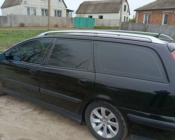 Черный Ситроен С5, объемом двигателя 2 л и пробегом 341 тыс. км за 4000 $, фото 2 на Automoto.ua