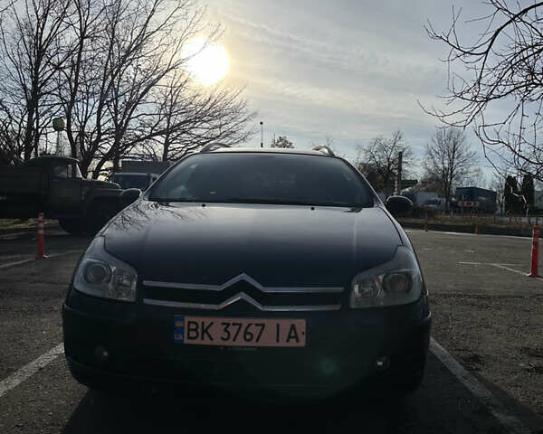Синий Ситроен С5, объемом двигателя 2 л и пробегом 243 тыс. км за 4500 $, фото 1 на Automoto.ua