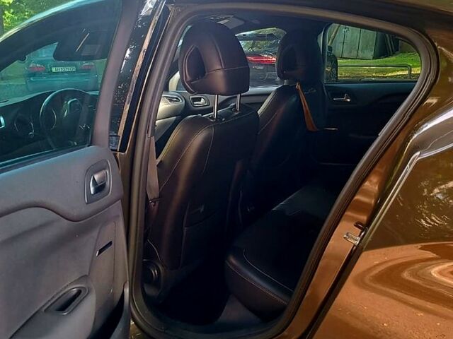 Коричневый Ситроен ДС4, объемом двигателя 2 л и пробегом 123 тыс. км за 10000 $, фото 1 на Automoto.ua