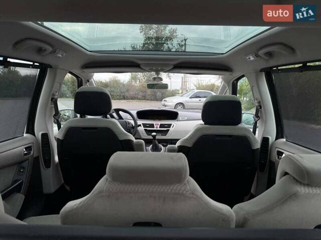 Черный Ситроен Гранд С4 Пикассо, объемом двигателя 1.7 л и пробегом 210 тыс. км за 7500 $, фото 31 на Automoto.ua