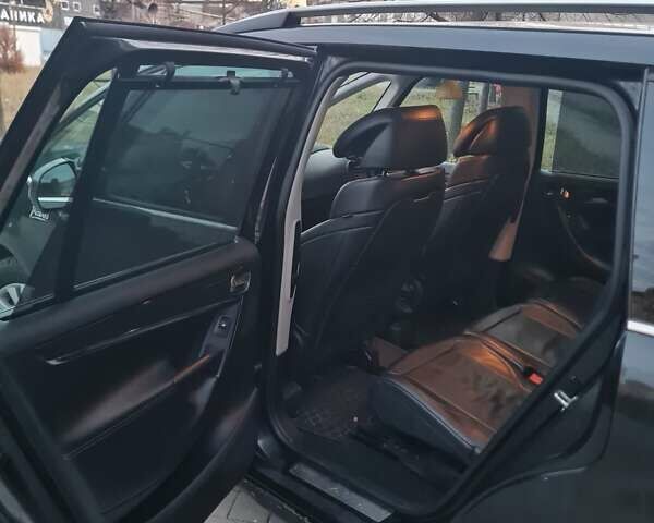 Черный Ситроен Гранд С4 Пикассо, объемом двигателя 1.56 л и пробегом 295 тыс. км за 4499 $, фото 1 на Automoto.ua