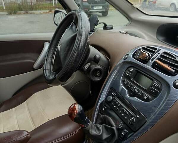 Коричневый Ситроен Ксара Пикассо, объемом двигателя 1.75 л и пробегом 400 тыс. км за 2700 $, фото 5 на Automoto.ua