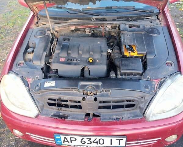 Красный Ситроен Ксара, объемом двигателя 2 л и пробегом 248 тыс. км за 3100 $, фото 1 на Automoto.ua