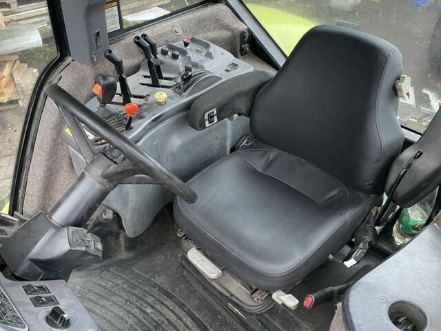 Зелений Клаас Чєлєнжер, об'ємом двигуна 7.2 л та пробігом 10 тис. км за 36980 $, фото 6 на Automoto.ua