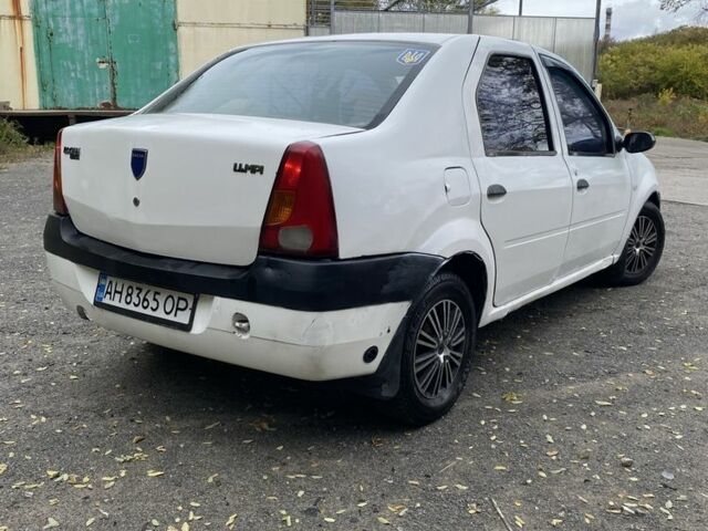 Белый Дачия Логан, объемом двигателя 1.4 л и пробегом 253 тыс. км за 1499 $, фото 4 на Automoto.ua