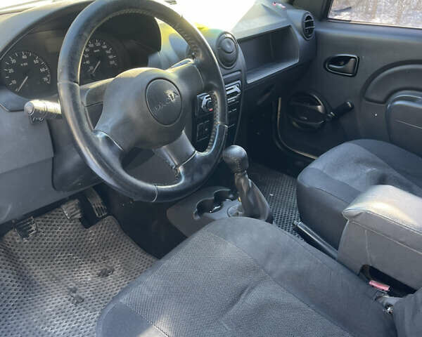 Білий Дачія Logan, об'ємом двигуна 1.4 л та пробігом 385 тис. км за 1800 $, фото 2 на Automoto.ua