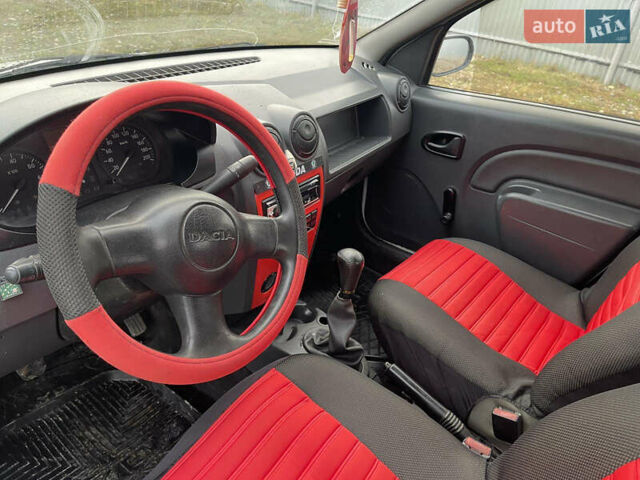 Белый Дачия Логан, объемом двигателя 1.4 л и пробегом 240 тыс. км за 1750 $, фото 9 на Automoto.ua