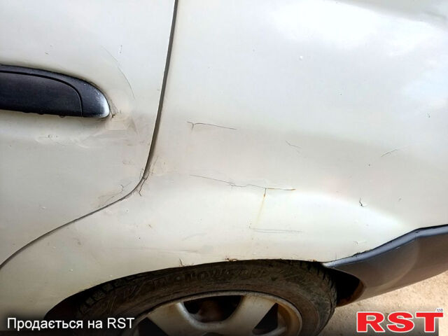 Белый Дачия Логан, объемом двигателя 1.4 л и пробегом 260 тыс. км за 2300 $, фото 5 на Automoto.ua