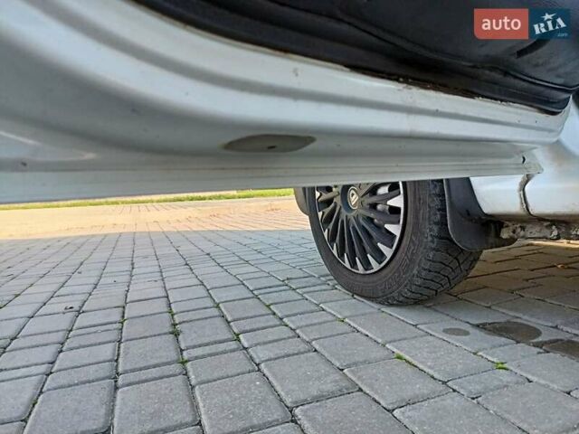 Білий Дачія Logan, об'ємом двигуна 1.46 л та пробігом 206 тис. км за 5300 $, фото 14 на Automoto.ua