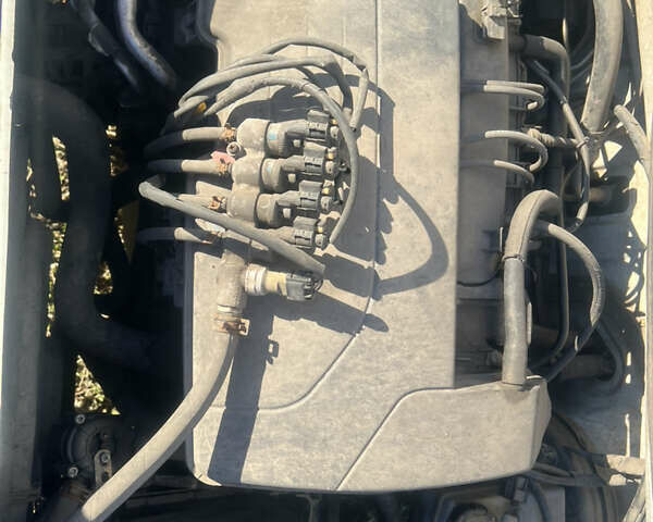 Белый Дачия Логан, объемом двигателя 1.2 л и пробегом 200 тыс. км за 5750 $, фото 23 на Automoto.ua