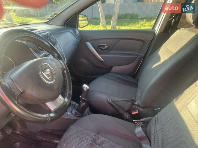 Белый Дачия Логан, объемом двигателя 1.2 л и пробегом 200 тыс. км за 5750 $, фото 12 на Automoto.ua